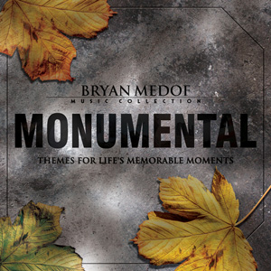Themes for Life's Memorable Moments. Photo of a gravestone with the word Monumental on it, surrounded by autumn leaves.